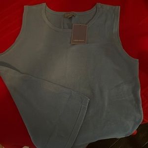 Women’s sleeveless sweater top size large light blue in color